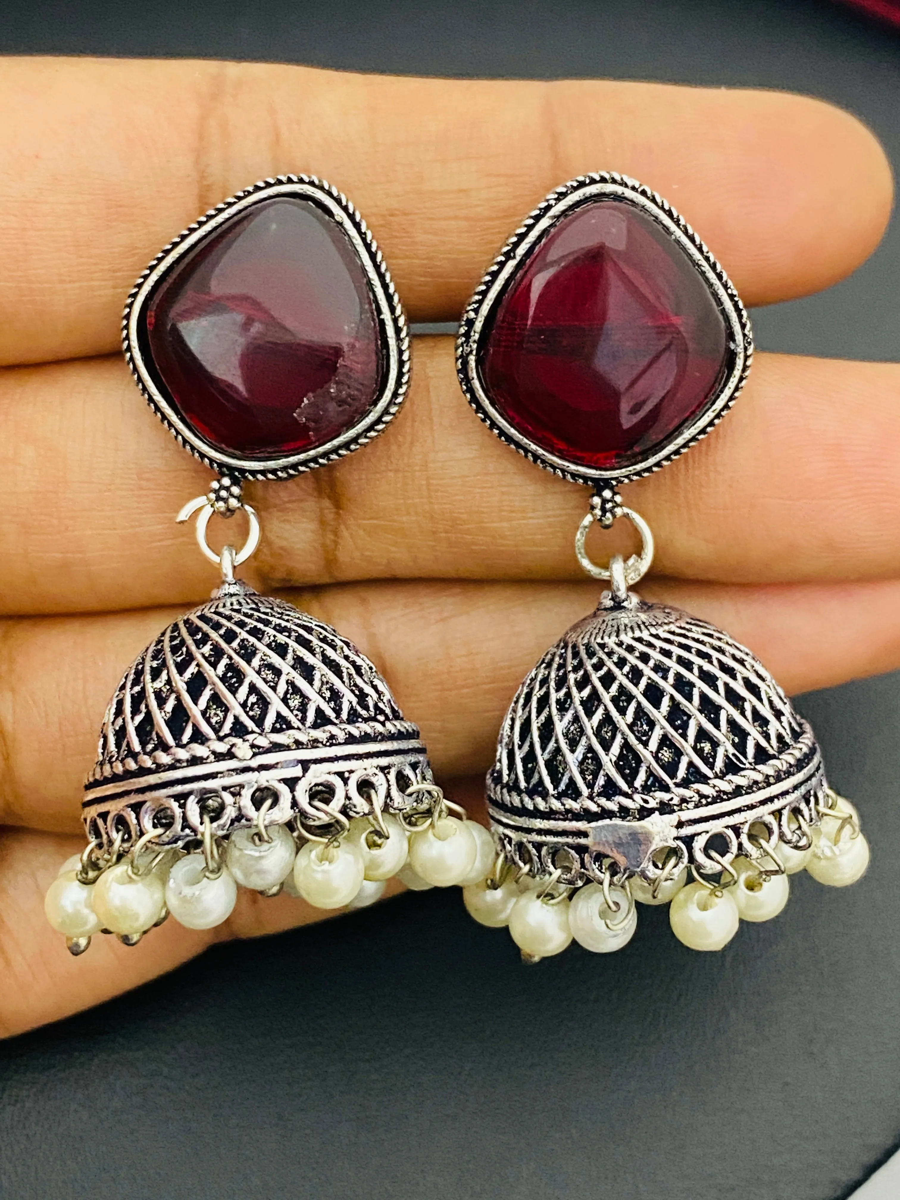 Charming Maroon Stone Beaded Designer German Silver Plated Oxidized Jhumkas With Pearl Hangings