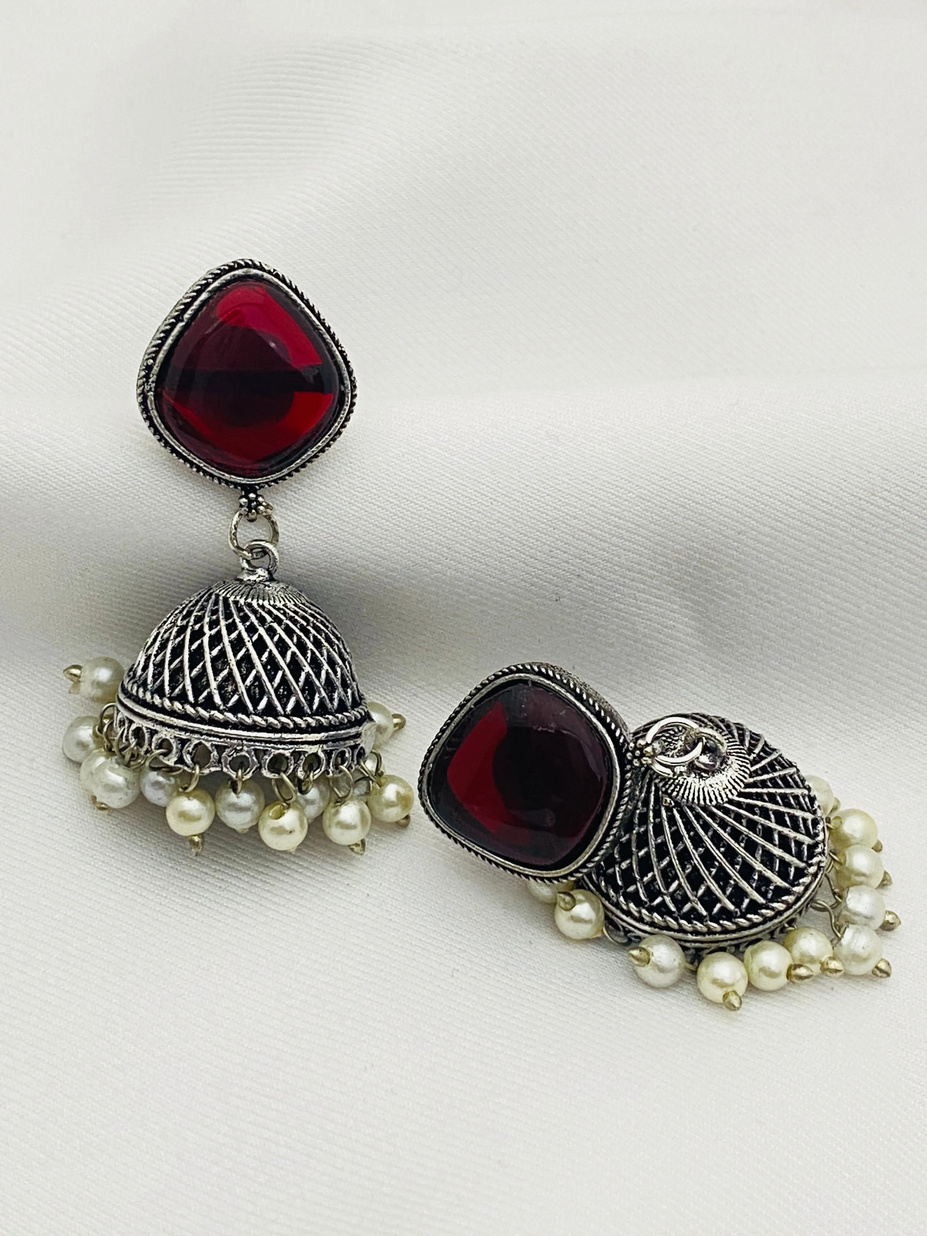 Charming Maroon Stone Beaded Designer German Silver Plated Oxidized Jhumkas With Pearl Hangings