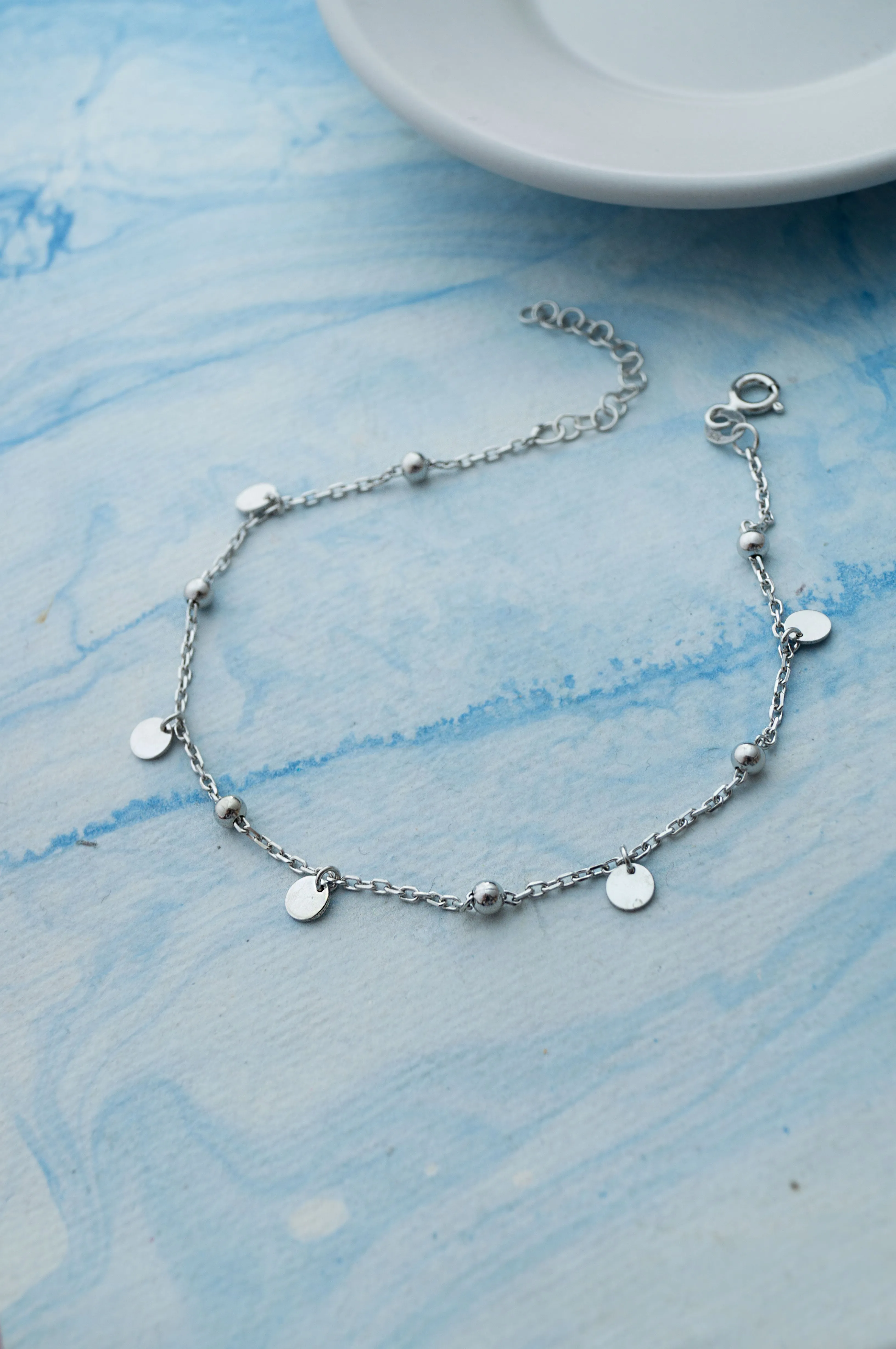 Gleaming Circle Charms Sterling Silver Chain Bracelet